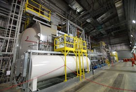 Some of the massive power supply machinery shown inside the synchronous condensor building at the Nalcor Energy site at Soldiers Pond.