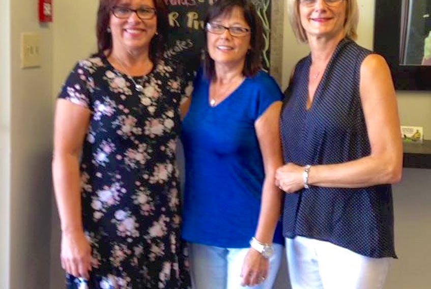 (From left) Joy Mercer, Regina Walsh and Lori Scaplen have found a new home at The Hair Studio and Spa, after working at the Sears Hair Studio for over 30 years.