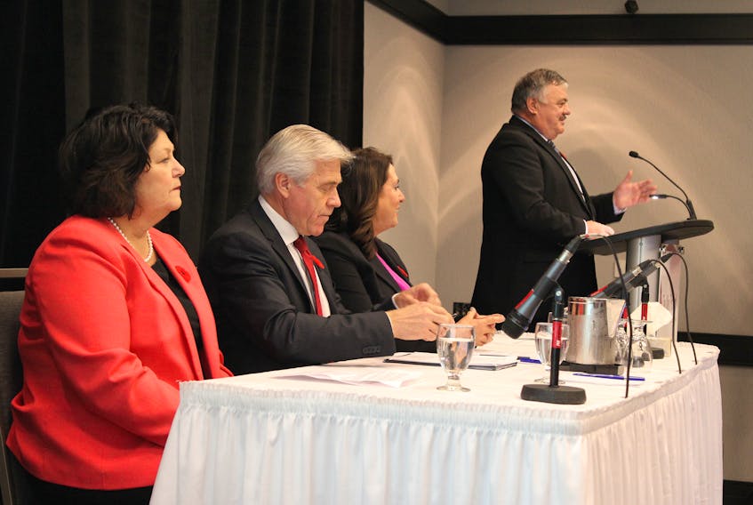 (From left) Mining Industry NL Chair Heather Bruce-Veitch, Premier Dwight Ball, Natural Resources Minister Siobhan Coady, and Labrador West MHA Graham Letto speak on the “Mining the Future” plan to delegates at the Mineral Resources Review conference and trade show in St. John’s Friday.