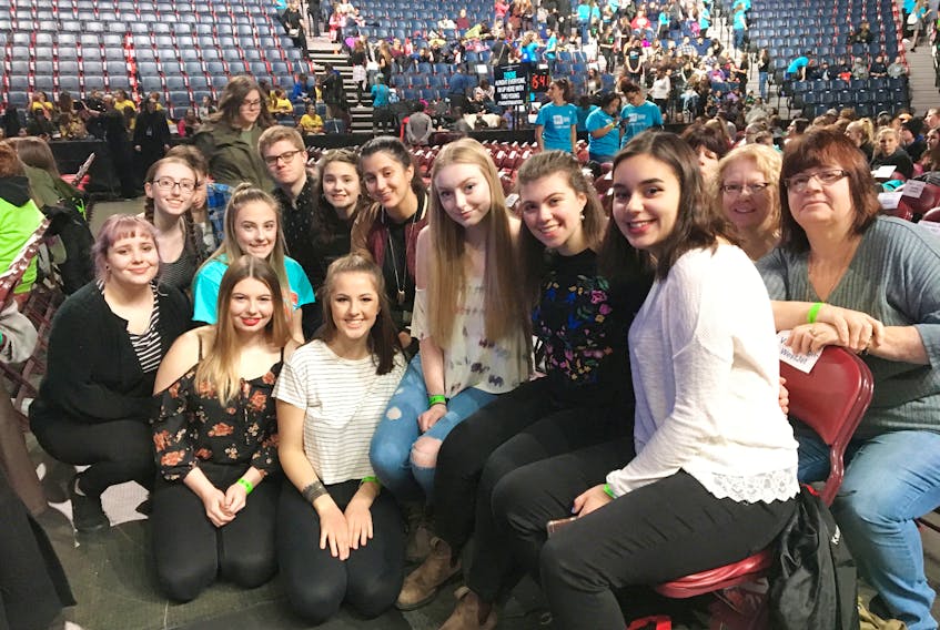 The students and their chaperones from Waterford Valley High School’s Social Justice group gathered at their seats in Scotiabank Place in Halifax just prior to the start of We Day Atlantic activities on Thursday. — Submitted