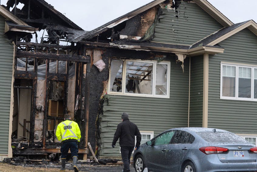 Fire investigators with the Royal Newfoundland Constabulary (RNC) were on the scene Friday trying to determine the cause of an overnight fire that destroyed the centre home of a triplex on Chateau Avenue in Foxtrap, Conception Bay South.