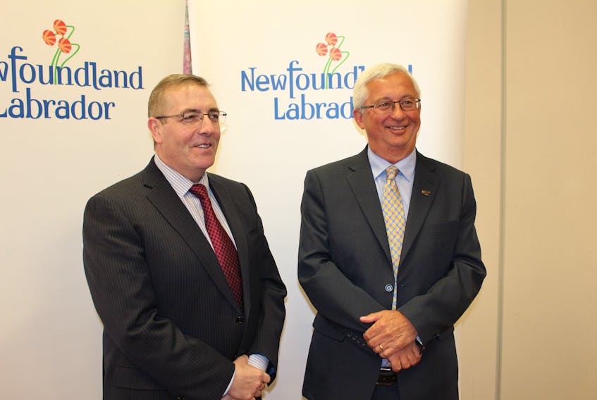 Minister of Transportation and Works Steve Crocker (left) and Jim Organ, executive director of the Heavy Civil Association of Newfoundland and Labrador announced a $77.2 million investment into repairs for the provinces transportation system this year.