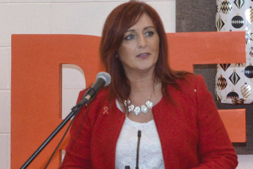 Liberal candidate Patricia Hynes-Coates speaks Tuesday during a rally at the Paradise Double Ice Complex.