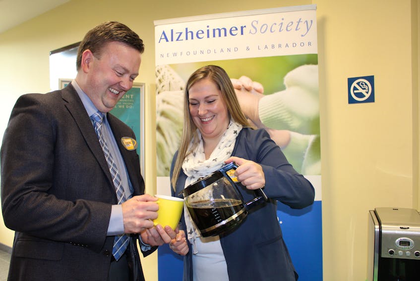 Sam McNeish/The Telegram
Jessica Flynn, event planner for the Alzheimer Society of Newfoundland and Labrador, was more than happy to serve up a few cups of coffee on Thursday as the Newfoundland and Labrador Credit Union (NLCU) hosted Coffee Break, an initiative hosted annually as an Alzheimer fundraiser. Flynn pours a coffee for Glenn Bolger, NLCU chief operating officer, during an event at the Freshwater Road Credit Union.