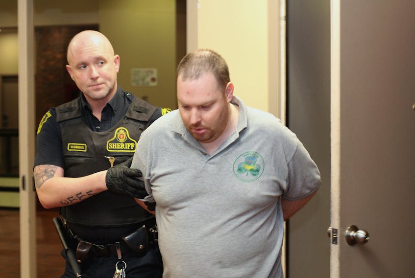 Jeremy Leonard, 36, is led from the cells at Atlantic Place to provincial courtroom No. 7 Tuesday afternoon, having been arrested the previous night in connection with three robberies in St. John’s.
