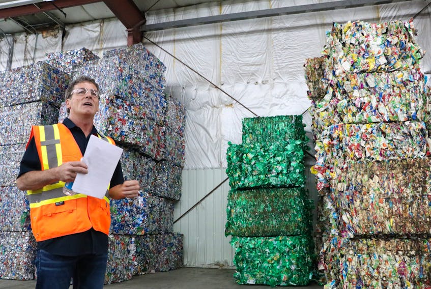 Kevin Sargent, CEO of Hebert’s Recycling Inc., explains the recycling process during a media tour of the company’s new plant in Mount Pearl Tuesday.