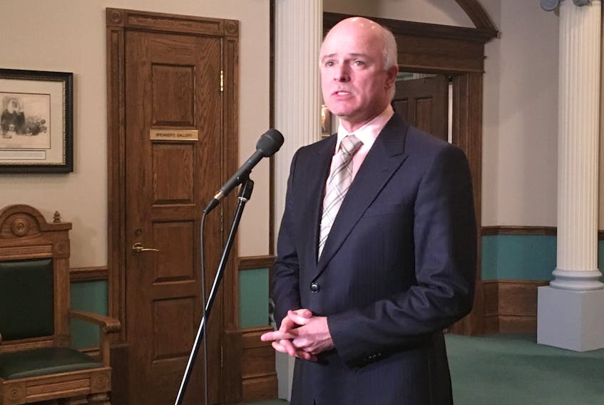 Newfoundland and Labrador Finance Minister Tom Osborne comments on the federal budget Tuesday evening, speaking with reporters outside the House of Assembly.