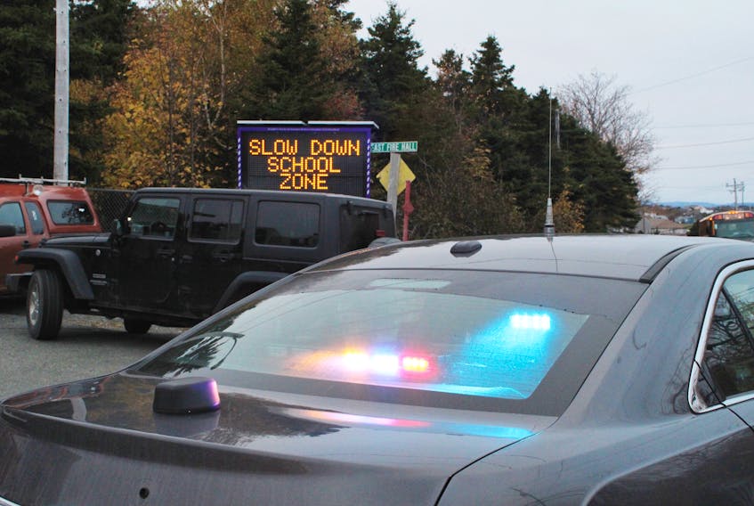 A neon sign that sits in front of the Conception Bay South Fire Department, located in the stopping zone for Topsail Elementary School, has a clear message — “Slow down, school zone.” The Town of C.B.S. and the RNC started an initiative on Monday aimed at student safety due to excessive speeding, distracted driving and motorists passing school buses.