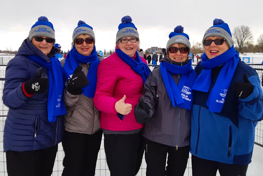 From left, Kitty Whelan, Anna O’Connell, Kay Aylward, Louise Hustins and Madonna Cardoulis, all breast cancer survivors, travelled to Ottawa last weekend and took part in the annual Ottawa Ice Dragon Boat Festival held on the Rideau Canal Skateway.
