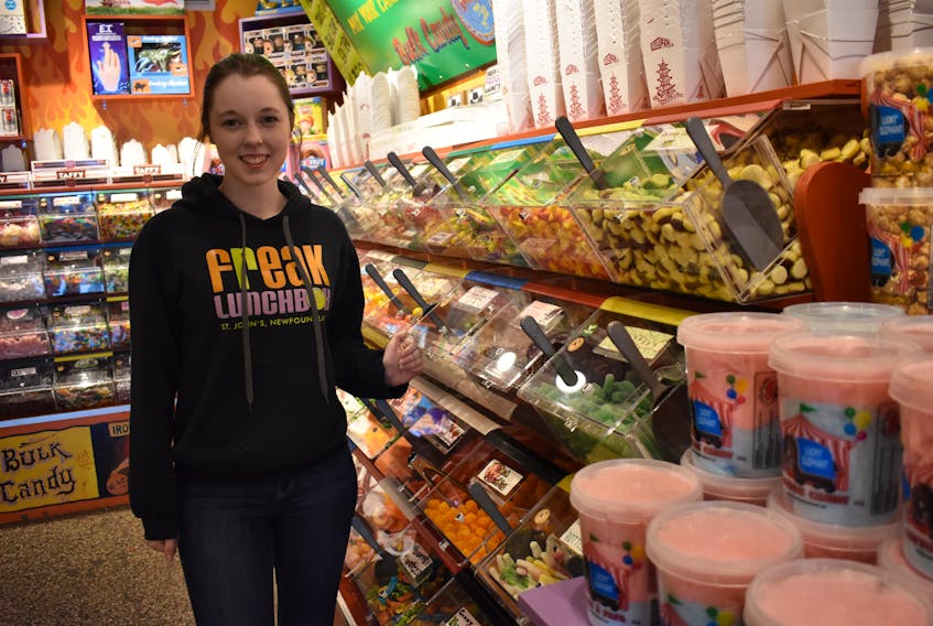 Julie Learning, a cashier at Freak Lunchbox in downtown St. John’s, is always happy to scoop bulk candy into a reusable container. — Melissa Wong/Special to The Telegram