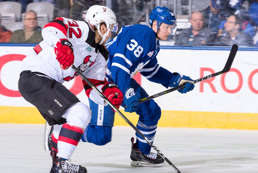 In this file photo from the 2017-18 seasons, St. John's native Colin Greening (38) is shown playing for the AHL's Toronto Marlies in a game against the Binghamton Devils. A report out of Toronto says Greening is retiring after a nine-year career in pro hockey. —Toronto Marlies/file photo