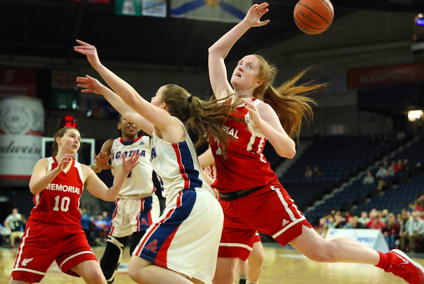 AUS photo - Memorial Sea-Hawks rookie Alana Short (7) looks to grab a loose ball during play in the Atlantic University Sport women’s basketball final Sunday in Halifax. The Sea-Hawks came up just short in their quest of pulling off an upset with an 84-74 loss to the Acadia Axewomen in the conference championship game at Scotiabank Centre.