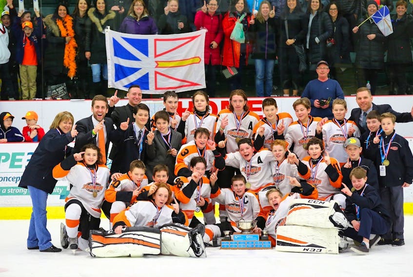 In this file photo, the host Tri-Com Thunder celebrate after winning the 2018 Atlantic AAA peewee boys hockey championship at the Conception Bay South Arena. There are be six Newfoundland and Labrador teams hoping for that same sort of feeling later this weekend as they open play in Atlantic AAA tournaments across the region, beginning today. — atlanticaaahockey.ca