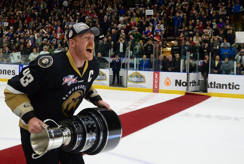 Newfoundland Growlers captain James Melindy celebrates after being presented with the Kelly Cup after the team's win over the Toledo Walleye in Game 6 of the ECHL final at Mile One Centre on Tuesday night.
