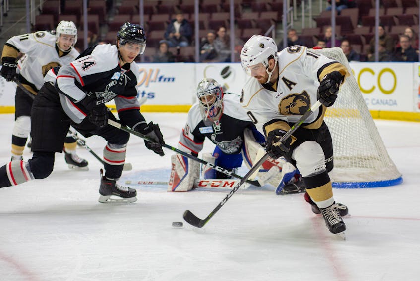 Zach O’Brien (right), shown in action for the Newfoundland Growlers against the Brampton Beast at Mile One Centre last weekend, has been called up from the ECHL team to the AHL’s Toronto Marlies. — Newfoundland Growlers photo/Jeff Parsons