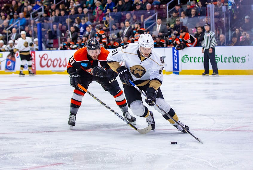 Defenceman Sam Jardine (right) made his Newfoundland Growlers debut at Mile One Centre last weekend against the Fort Wayne Komets, including his numerical counterpart, Marc-Oliver Roy (left).
