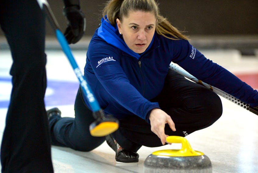 Skip Kelli Turpin delivers a stone during play in the provincial Scotties Tournament of Hearts final Sunday at Bally Haly Country Club in St. John’s. Turpin beat Cathlia Ward to earn a trip to the nationals.