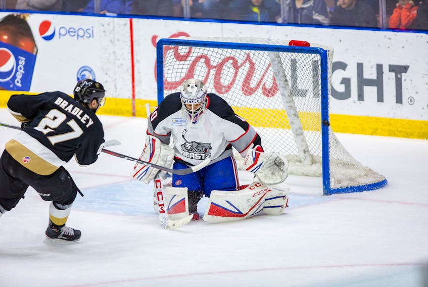 Brampton Beast goaltender Etienne Marcoux stymied the Newfoundland Growlers, including forward Matt Bradley, on countless occasions in Game 2 of their ECHL playoff series Saturday night at Mile One Centre. But Growlers’ coach John Snowden said his team’s ability to “stick with it” provided them with an eventual overtime victory and a lesson that they’ll take into the next phase of the best-of-seven series, beginning with Game 3 tonight in Brampton. — Newfoundland Growlers photo/Jeff Parsons