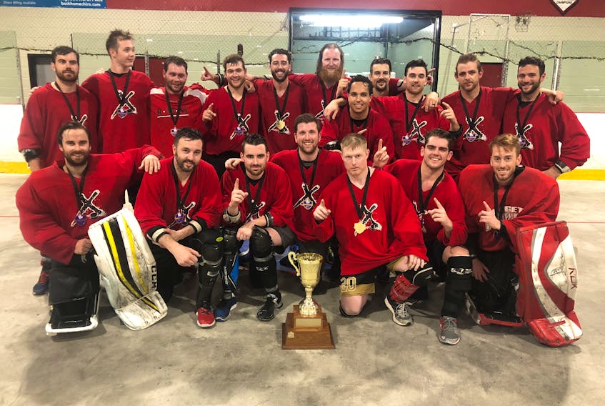 Just about all of them have starred, or continue to star, on the ice, but the Crown Cabinets ball hockey players are pretty good on the floor, too. Witness their win in the Tier 1 division of the provincial ball hockey championship held over the weekend in St. John’s. Of the 18 players on the roster, six are currently playing, or have played, ice hockey professionally, and six more are playing, or have played in the Quebec Major Junior Hockey League, with two of the latter group — Marcus Power, who recently signed with the ECHL’s Newfoundland Growlers, and Adam Holwell, who attended the Toronto Maple Leafs’ development camp — poised to embark on pro careers. Members of the Crown Cabinets squad include (from left) first row: Evan Mosher, Ryan Delaney, Cody Donaghey, Jordan Escott, Jamie Tobin, Joel Bishop, Scott Bray; second row: Zach O’Brien, Andrew Picco, Brandon Bussey, Adam Holwell, Clark Bishop, Justin Pender, Marcus Power, Stephen D’Abadie, Danny Wicks, Alex Powell and Chris Owens. Mosher and Owens play professionally overseas; Clark Bishop, Donaghey and O’Brien skated in North American pro circuits in 2017-18; and Pender is a former ECHLer. Picco, Joel Bishop, Wicks and Escott are the others who have suited up with QMJHL teams.