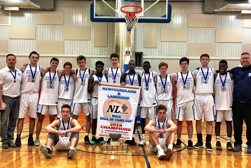 The Holy Heart of Mary Highlanders beat the Gonzaga Vikings 89-41 Sunday to win the Hall of Fame Cup. Members of the winning team are, from left, first row: Devon Tobin, Caleb d’Entremont; second row: assistant coach Dave d’Entremont, Hunter McGrath, Eli Brown, Ben Chislett, Josh Reimer, J.P. Agbesse, Dafydd Banfield, Dem Lam, Liai Tong, Michael Burt, Curtis Corrigan, Nic Meaney, Innocent Ndaitouroum and coach David Banfield.