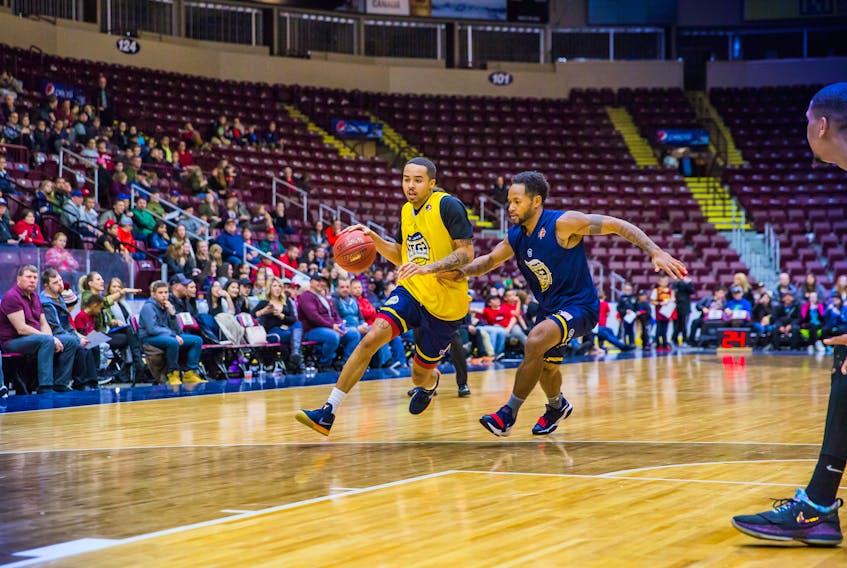 In this Nov., 2017 file photo, Jarryn Skeete (left) moves the ball downcourt while being guarded by Rashaun Broadus during a St. John’s Edge pre-season intra-squad game at Mile One Centre in St. John’s. The Edge will be holding another intrasquad game as part of their preseason preparations this fall, but this time it will be in Grand Falls-Windsor. That’s because the team has announced it will be holding its 2018 training camp in the central Newfoundland town. — File/St. John's Edge