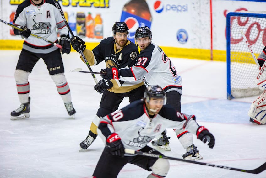 In this April 12, 2019 file photo, Zach O’Brien (left) of the Newfoundland Growlers and Aaron Luchuk (27) of the Brampton Beast jostle in front of the Brampton goal during the first game of the ECHL’s North Division final at Mile One Centre. O’Brien and Luchuk are now teammates on The Growlers, who face the Beast tonight and Saturday at Mile One. — Newfoundland Growlers file photo/Jeff Parsons
