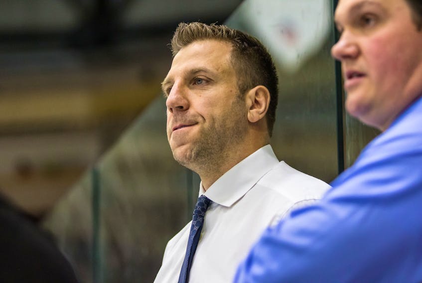 Newfoundland Growlers head coach Ryane Clowe is shown on the bench before an ECHL game at Mile One Centre earlier this season. Clowe has missed the Growlers’ last five road games for what the parent Toronto Maple Leafs say are “medical reasons,” and a statement from the Leafs Tuesday would seem to indicate there is a real possibility he won’t be available for three away games in Florida, beginning with a matchup in Jacksonville tonight. — Newfoundland Growlers photo/Jeff Parsons