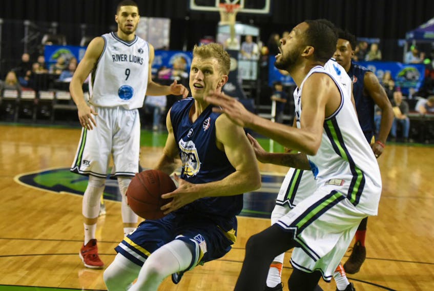Niagara River Lions photo
Tyler Haws of the St. John’s Edge drives through the paint past a Niagara River Lions defender during an NBL Canada game Sunday in St. Catharines, Ont. The Edge won the game 122-104.