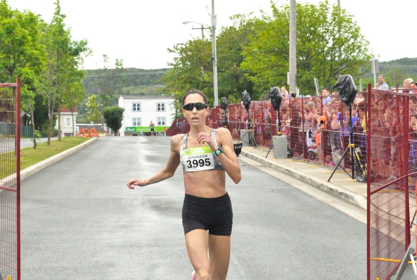 Jennifer Murrin of St. John’s shows winning form to close out her race in the 91st Tely 10 Sunday. Murrin covered the 10 miles in just under 57 minutes to win her second straight Tely 10 crown. Her time was the sixth-fastest ever recorded, and she finished ninth overall.