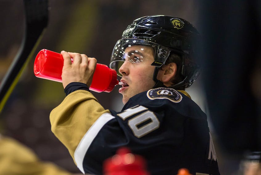 Of the seven leading scorers on the Newfoundland Growlers, six of them are rookies, including Ryan Moore, shown getting some hydration during ECHL action at Mile One Centre earlier this month. - Newfoundland Growlers/Jeff Parsons