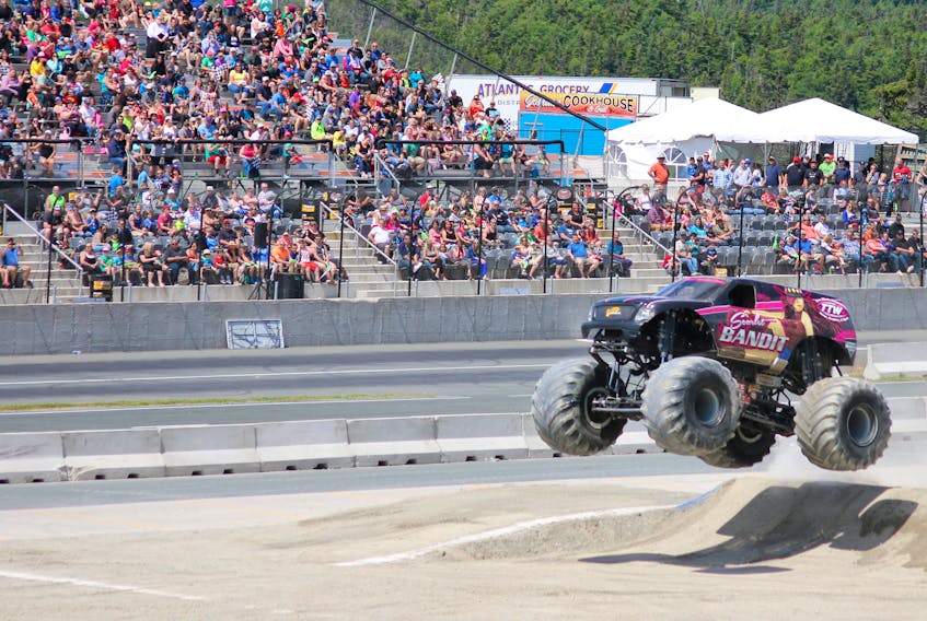 Scarlett Bandit, driven by Dawn Creten, is one of the entries for World Series of Monster Truck shows at Eastbound Park in Avondake this summer.