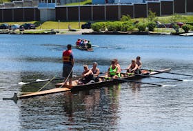 With just two days until the 200th anniversary Royal St. John’s Regatta, crews of all levels were working hard, getting in final practice sessions on Monday afternoon at Quidi Vidi Lake. Here, two crews are on the pond for their last spins, including one getting final instructions from the coxswain.