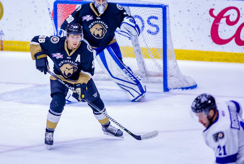 Defenceman Mike Kapla, shown playing for the Newfoundland Growlers in an ECHL game at Mile One Centre earlier this season, is the 10th player to be called up from the Growlers to the AHL’s Toronto Marlies and play a game for the Marlies this season. Kapla is one of three defencemen brought up to the Marlies during the Growlers’ holiday break, which ends with a game against the Worcester Railers tonight at Mile One Centre. — Newfoundland Growlers photo/Jeff Parsons