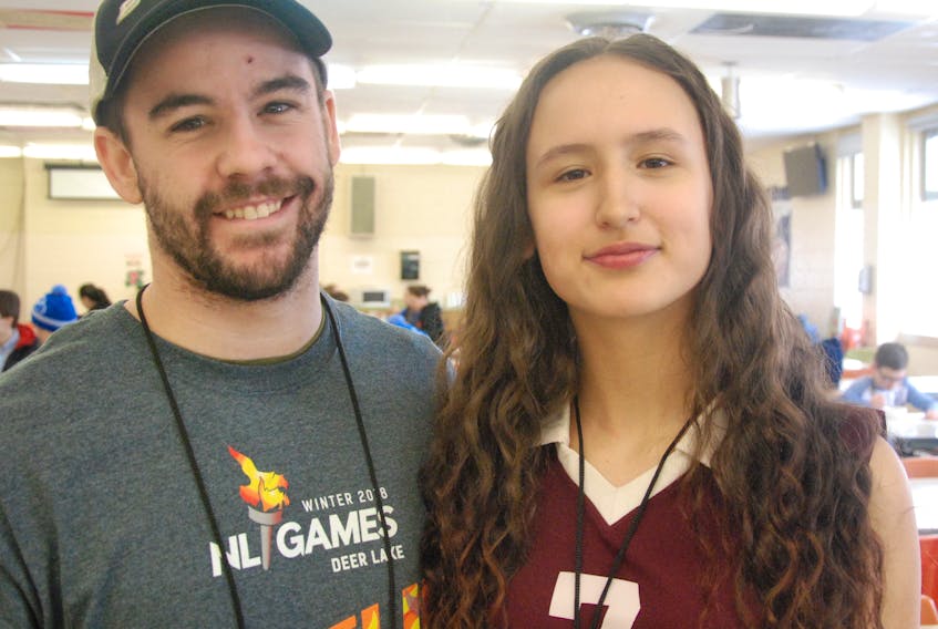 Shane Morgan, coach of the Team Indigenous female volleyball team, poses with Brianna Wolfrey, one of his players, at the 2018 N.L. Winter Games athletes’ village in Deer Lake.