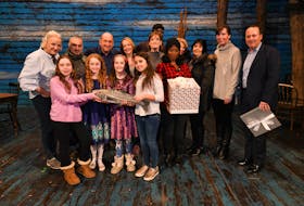 The Anne Hutchinson School in Eastchester, N.Y., made cards for families who lost loved ones on 9-11.  In addition, the children each donated $1 to the charity Broadway Cares. Pictured along with members of the “Come From Away” cast are school principal Annette Keane, student council moderators Bobbi Iacovelli and Felicia Maldari, Nick Katsoris and several of the Sweet Treat Girls (Siena Versaci, Julia Katsoris, Caitlin Savitt and Taylor Naclerio). They presented cards to the cast from their school and sent to families at the 9-11 Tribute Museum. The girls also presented a cheque for $1,103 from the money raised.  It was a way to say thanks to all the people of Gander for showing New Yorkers the true meaning of kindness and for inspiring the Loukoumi Make A Difference Foundation to embark on this project with “Come From Away.”