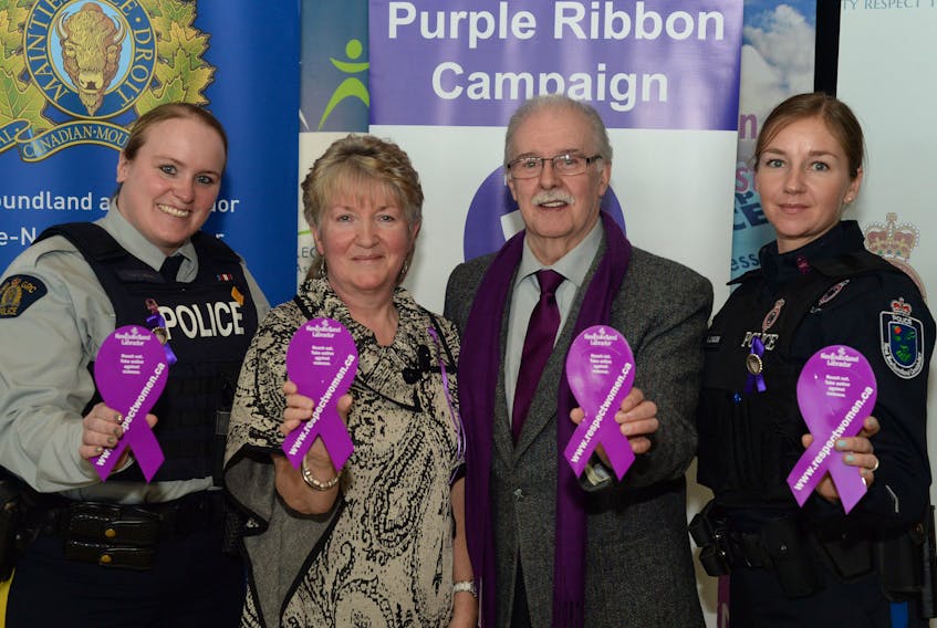 Pictured following the formalities with the symbolic Purple Ribbons are (from left) RCMP Const. April Janes-Gavel of the RCMP’s Indigenous Policing and Restorative Justice section, Debbie and Phillip Hibbs, and RNC Const. Lindsay Dillon of the RNC’s Intimate Partner Violence section.