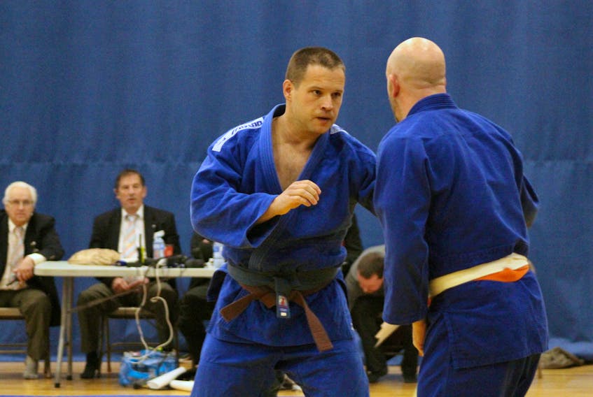 Dave Banko (facing front) of St. John's BJJ and Judo fights Jacob Luksic of Kokoro Judo Club and also from St. John's, in a match at the Newfoundland and Labrador Spring Provincial Judo Tournament at the St. John's PowerPlex on Saturday. Banko went on to win the gold medal in the Male Masters + 100 kg division.