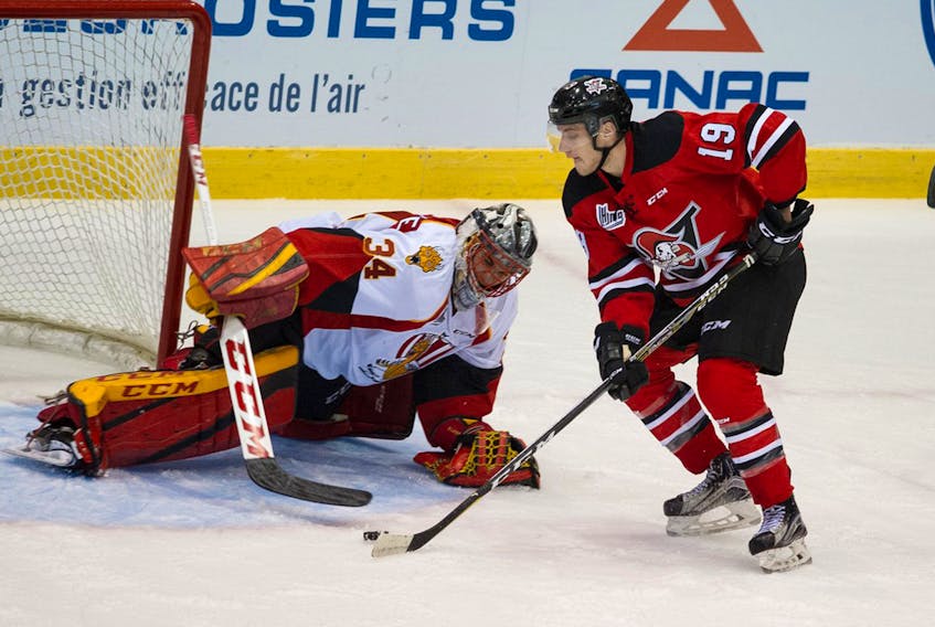 Drummondville Voltigeurs/Twitter — Bay Roberts native Dawson Mercer (right), shown playing for the Drummondville Voltigeurs ain a QMJHL game against he Acadie-Bathurst Titan, is one of three Newfoundlanders selected to play for Canadian teams at the World Under-17 Hockey Challenge next month in British Columbia.