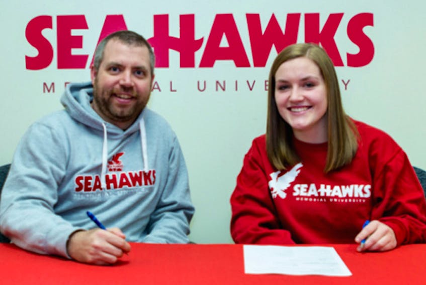 Memorial Athletics photo — Memorial Sea-Hawks volleyball coach John Slauenwhite was more than happy to see Margaret Henley sign on with the team.