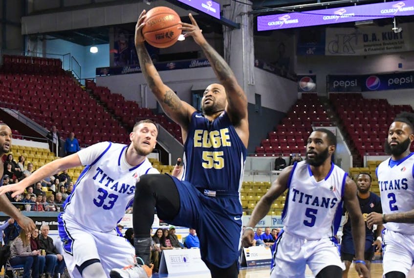 K-W Titans photo/via sjedge.ca - Junior Cadougan (55) and Glen Davis (left) each had 24 points for the St. John’s Edge Saturday in Kitchener, Ont., but it wasn’t enough to keep the Edge from losing 117-105 to the KW Titans, a result that extended St. John’s road losing streak to six games.