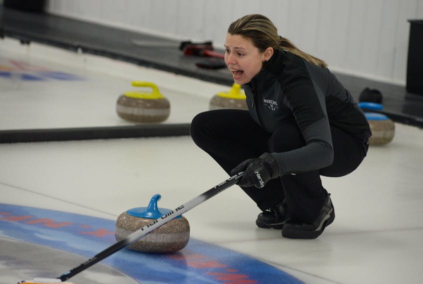 Skip Stacie Curtis shouts instruction to her sweepers during a game against Beth Hamilton’s rink at the Scotties provincial women’s curling championship Thursday at the Re/Max Centre in St. John’s.