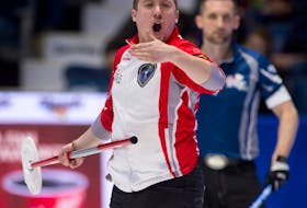 Michael Burns/Curling Canada
Newfoundland and Labrador skip Greg Smith shouts instructions with gusto to his sweepers during play in his Tim Hortons Brier game against Nova Scotia Sunday. Smith lost a tough one by a 9-6 count to fall to 0-2.