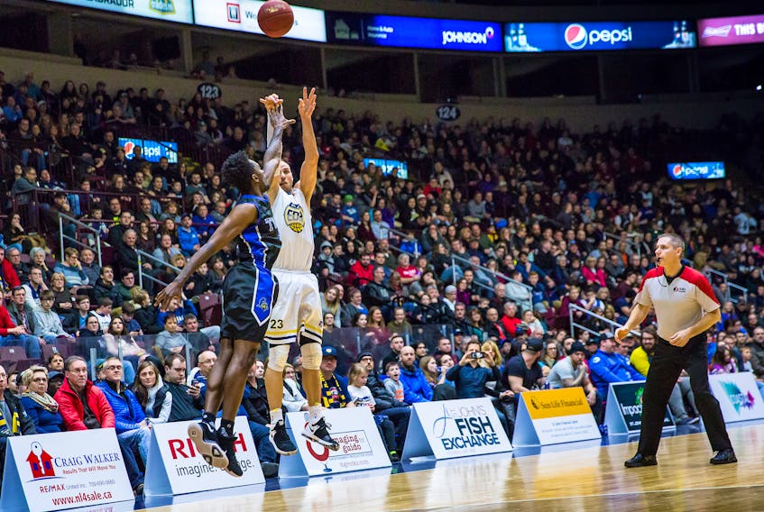 St. John's Edge photo/Jeff Parsons
Carl English gets a shot off despite a KW Titans defender in his face Saturday night at Mile One Centre. English finished the night with 58 points, a career and NBL Canada single-game scoring record.