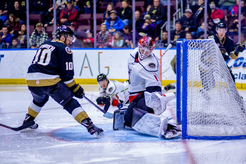 Zach O’Brien (10) scored twice, including in overtime, as the Newfoundland Growlers continued their home-ice success with a 3-2 win over the Adirondack Thunder and goalie Evan Cormier in ECHL play Saturday night at Mile One Centre. — Newfoundland Growlers photo/Jeff Parsons