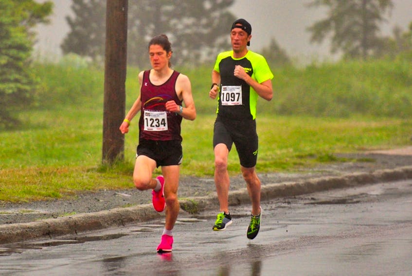 There wasn’t much to choose between eventual winner Matt Noseworthy (left) and runner-up  David Freake in Sunday’s Mews 8K. — 
NLAA photo