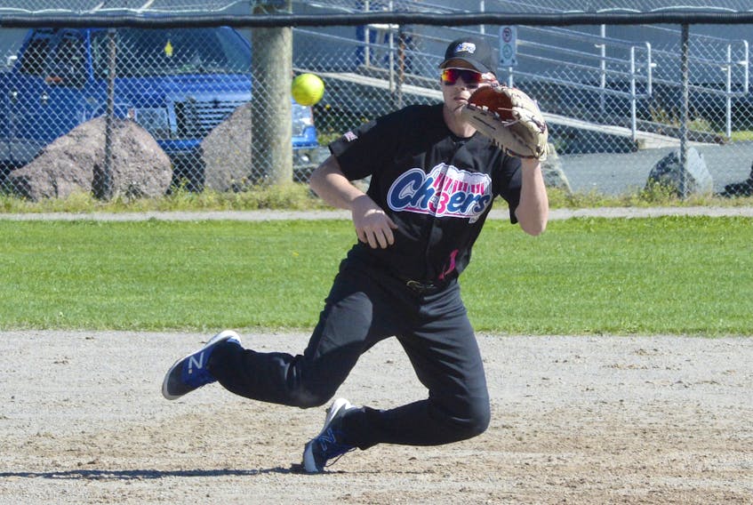 3 Cheers Pub Bud Light Dodgers’ shortstop Tony Meade gets ready to snag a ball during a St. John’s Molson senior softball semifinal game against the Kelly's Pub Molson Bulldogs at Lions Park Sunday afternoon.