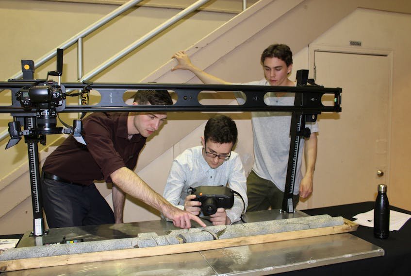 Jacob Manning (left), Cole Inkpen (centre) and Mason Gulliver work on documenting a core sample with hyperspectral imaging as part of their potential giodata business venture during the College of the North Atlantic’s Prince Philip campus Innovation at Work! Event held Tuesday.