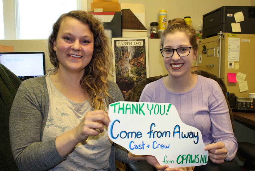 Kathy Unger and Mary Alliston Butt with CPAWS-NL want to say thank you to the “Come From Away” cast and crew for the donation to their marine program.