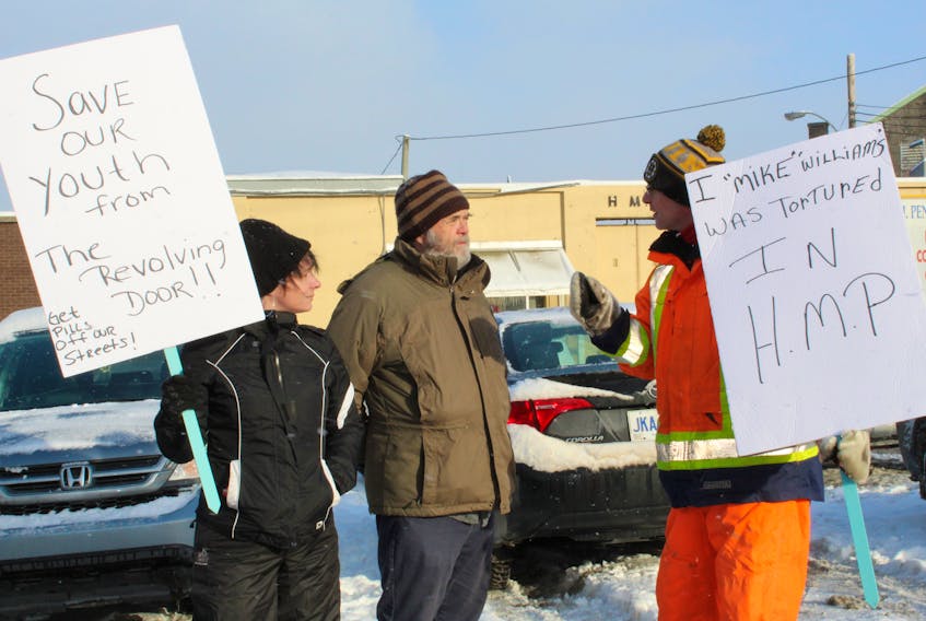 Lisa Reardigan of St. John’s and actor Andy Jones(centre) joined former convict Mike Williams (right) at the Her Majesty’s Penitentiary Thursday morning for a protest
