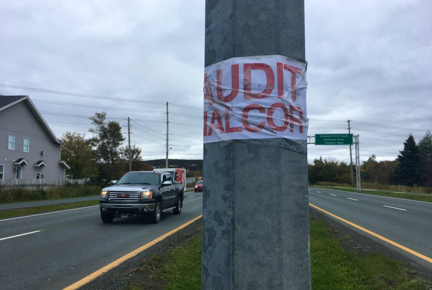The Prince Philip Parkway was papered with “Audit Nalcor” signs Monday.